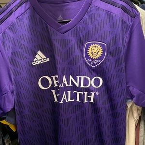 size L orlando city home soccer jersey! NWT!